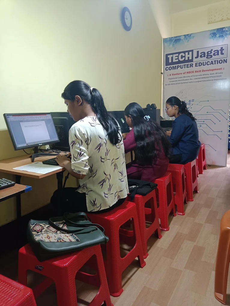 Students practising on computers at TECH Jagat Computer Education, Silchar